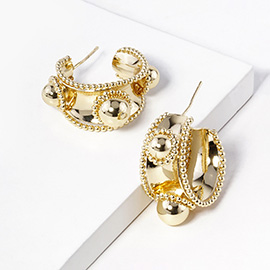 Gold Dipped Textured Metal Hoop Earrings