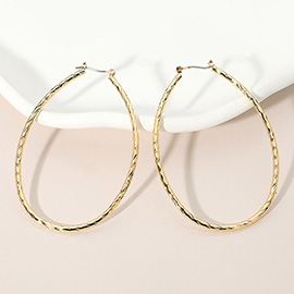 Gold Dipped Twisted Oval Pin Catch Hoop Earrings